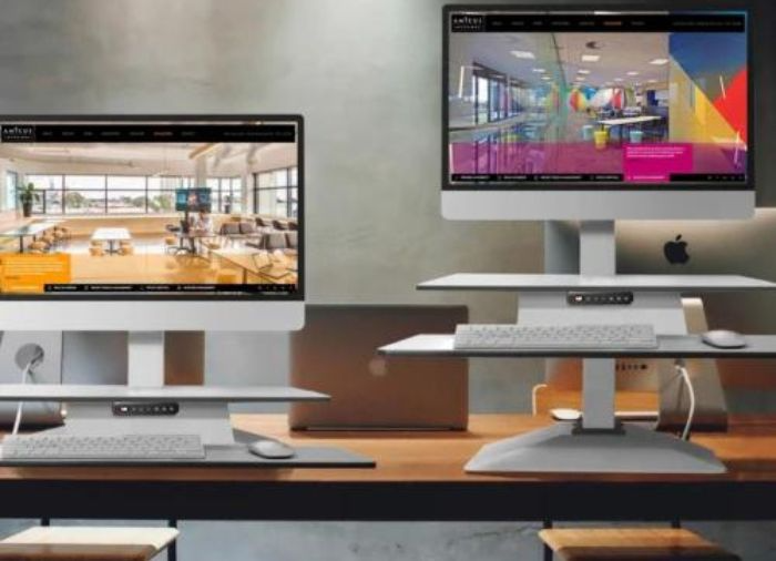Dual monitor standing desk converter for sedentary lifestyle