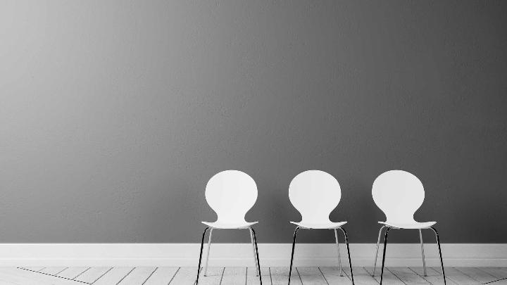 Empty chairs showing the effects of poor ergonomics 